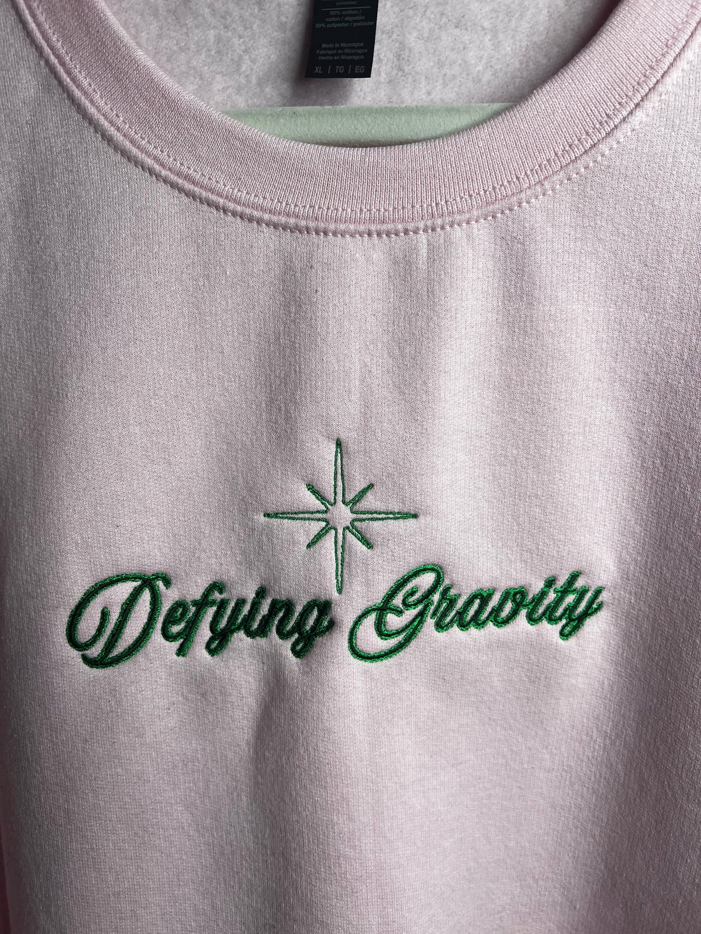 Defying the Odds Cursive Embroidered Crewneck